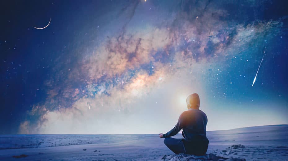 Person meditating under a starry sky and crescent moon, surrounded by a cosmic landscape.